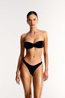 Black Azura twist bandeau bikini top and high cut bottoms on model, Bailee Swim