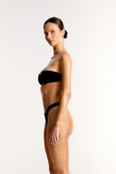 Black Azura twist bandeau bikini top and high cut bottoms on model, Bailee Swim